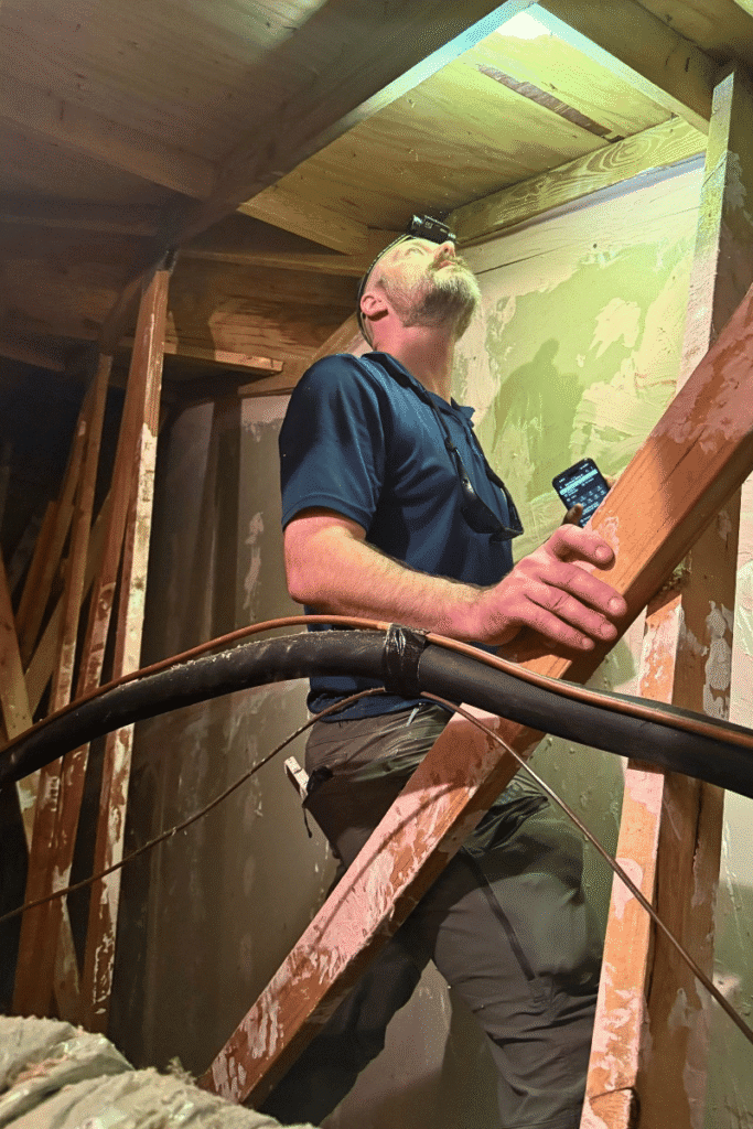 Home inspector performing a 4-point inspection